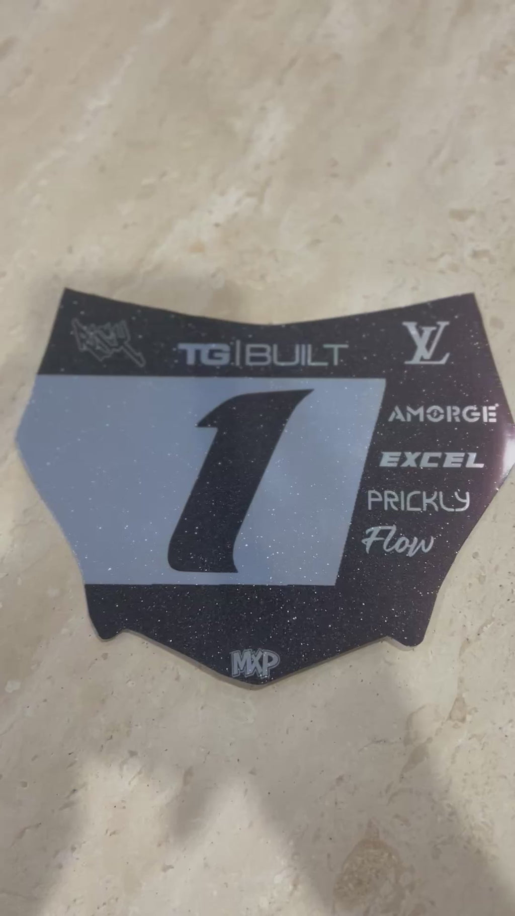 MotoCutz front plate decal in black with silver number 1 and TG Built, Excel and Prickly logos