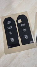 Talaria X3 fork decal pair in black with EXT and TG Built logos on backing sheet