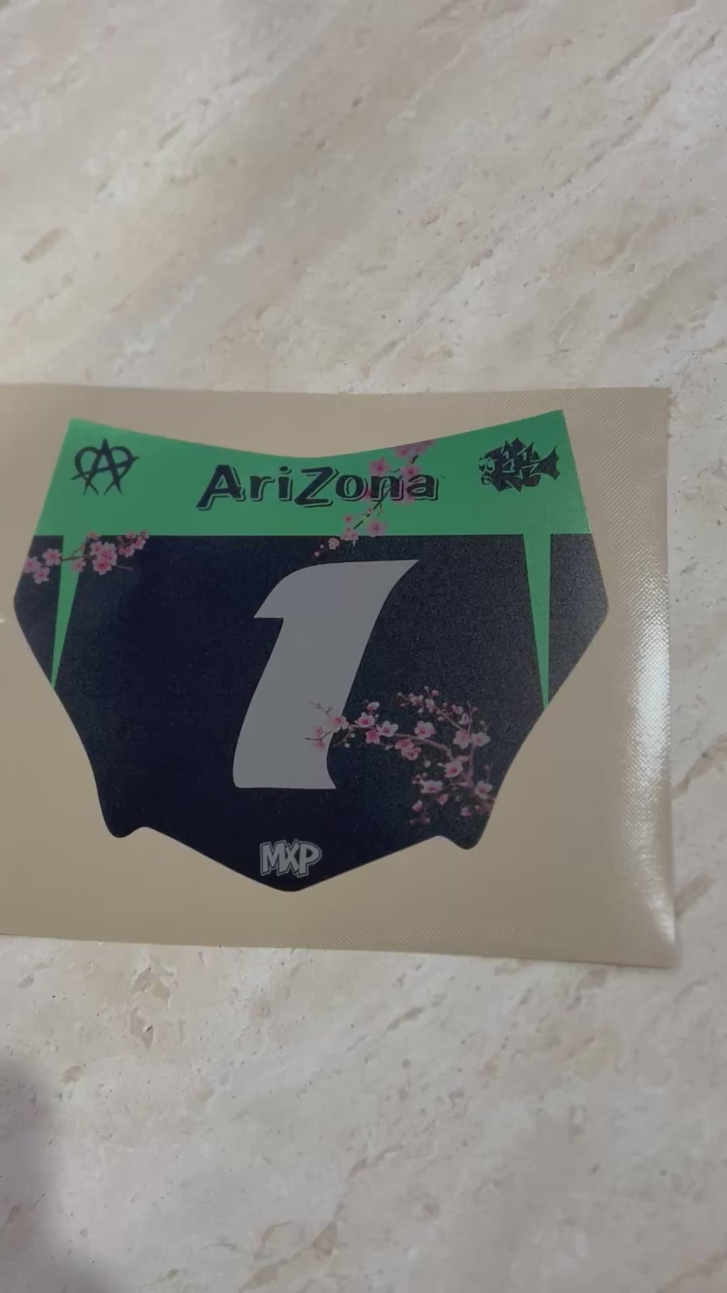 Limited edition AriZona front plate decal in black and green with silver number 1 and blossom detail